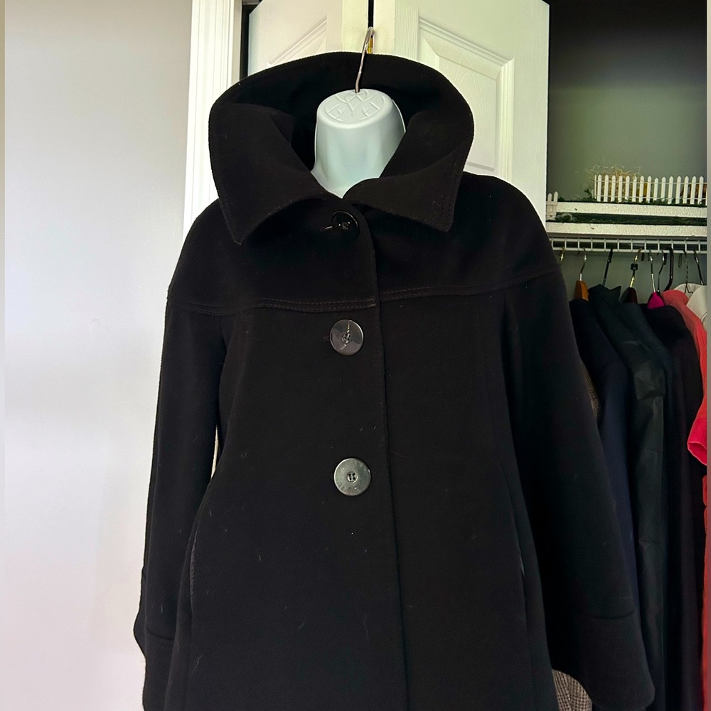 This black Zara coat is all wool in a large.